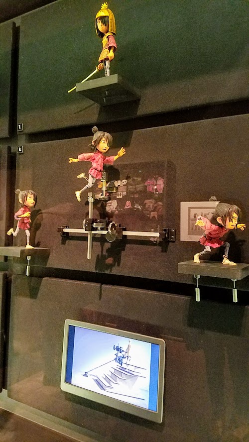 Animating Life, Laika Exhibit at Portland Art Museum, showing Kubo running stop motion frames and the support needed for the puppet