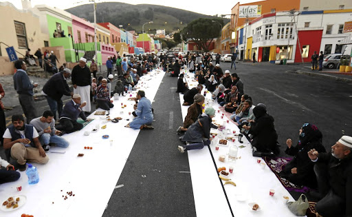 Residents of the Bo-Kaap celebrate the 'iftar' (breaking of the fast) in Wale Street, Cape Town.