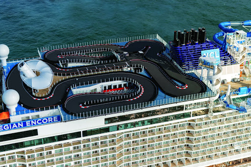 ncl_Encore_aerial_closeup.jpeg - The top deck of Norwegian Encore shows the ship’s Speedway, the longest race track at sea. 