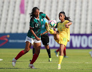 Banyana Banyana defender Ayesha Moosa tries to control the ball under pressure from Helisoa Randrianarivelo of Madagascar during their Cosafa Women's Championship at Dobsonville Stadium. 