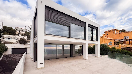 Modern white house with large glass windows in this luxury villa for sale in El Campello ($3,034,059 - 341 m²)