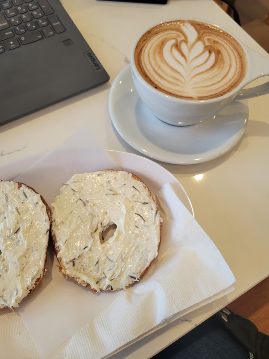 Gluten Free Everything Bagel with House-Made Garlic and Rosemary Cream Cheese and a Seasonal Raspberry Latte.