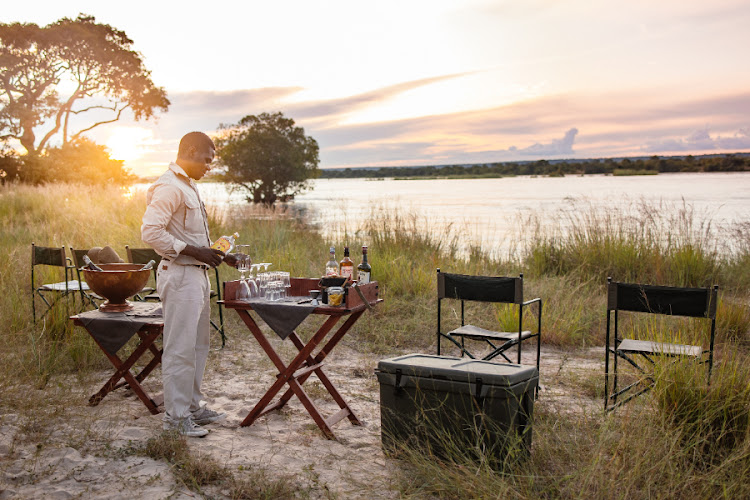 Sundowners at Tsowa Safari Island.