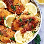 Crispy Parmesan Chicken with Creamy Lemon Garlic Pasta was pinched from <a href="http://therecipecritic.com/2016/03/crispy-parmesan-chicken-with-creamy-lemon-garlic-pasta/" target="_blank">therecipecritic.com.</a>