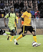 IN CONTROL:
       Chiefs' Tsepo Masilela  evades Ndumiso Mabena of Platinum Stars 
      photo: Philip Maeta/Gallo Images