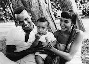 Calypso star Harry Belafonte with his wife Julie Robinson and their nine-month-old son David near Genoa in Italy.