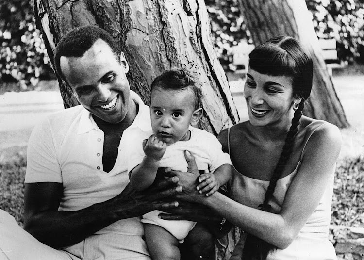 Calypso star Harry Belafonte with his wife Julie Robinson and their nine-month-old son David near Genoa in Italy.