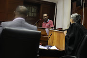 Phoenix triple murder accused Collin Pillay answers questions put to him by state prosecutor Cheryl Naidu on Tuesday.