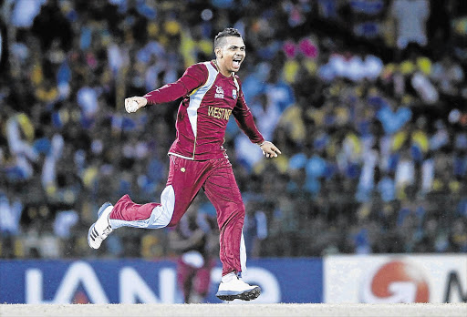 West Indies' Sunil Narine celebrates after taking the wicket of Sri Lanka's Nuwan Kulasekara during the World Twenty20 final in Colombo yesterday which sealed his team's triumph Picture: DINUKA LIYANAWATTE/GALLO IMAGES