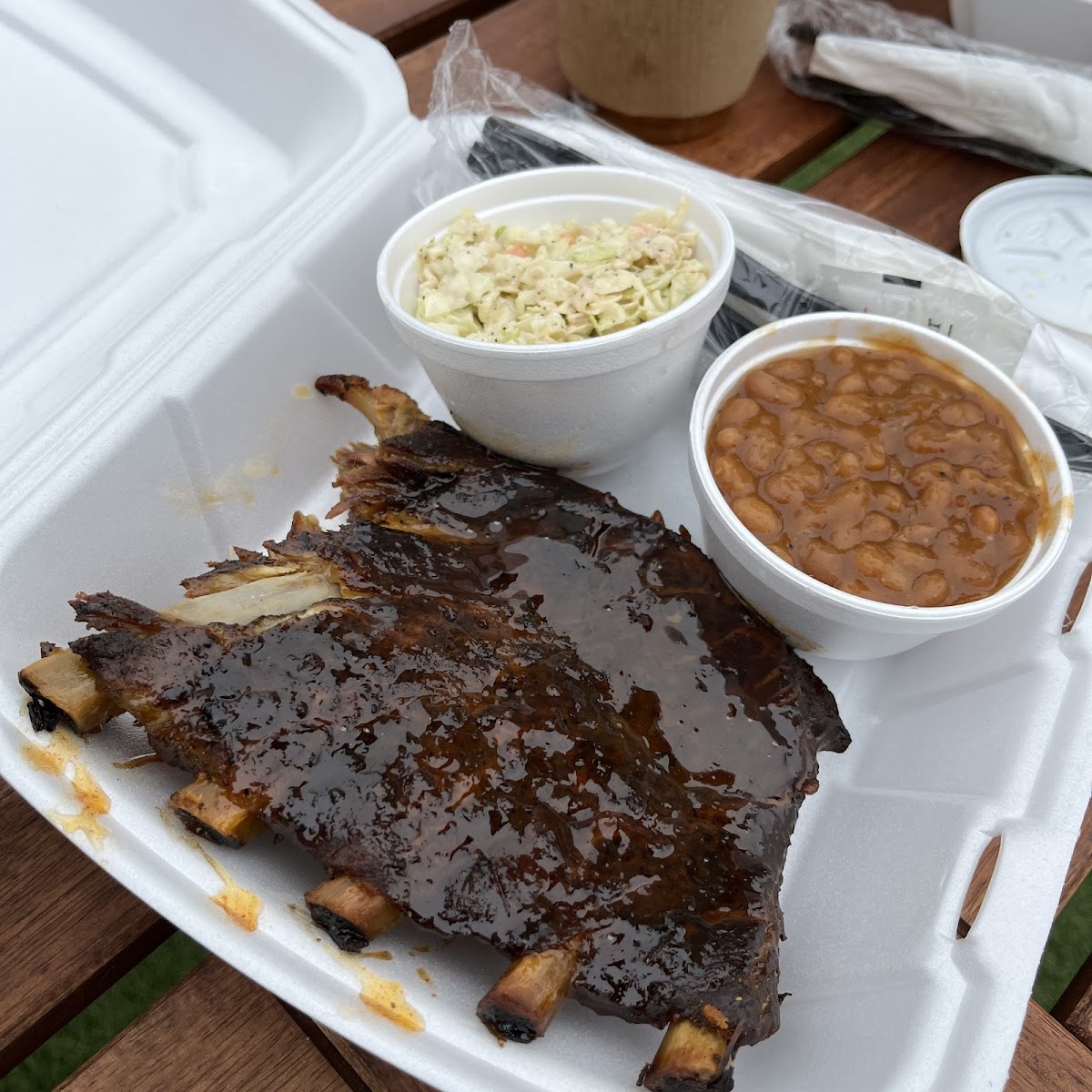 1/3 rack ribs, baked beans, slaw