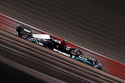 Valtteri Bottas of Finland driving the (77) Mercedes AMG Petronas F1 Team Mercedes W12 on track during the F1 Grand Prix of Bahrain at Bahrain International Circuit on March 28, 2021 in Bahrain, Bahrain.
