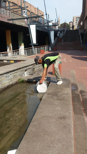 Taxi driver Andre Felix, 53, collects water from the Jetty Street fountain to wash his vehicle. The fountain at the bottom of the Route 67 Nelson Mandela memorial was probably created from the well that was sunk on the spot in 1860