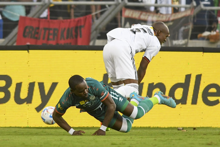 Gabadinho Mhango of AmaZulu gores down under a challenge from and Nkosinathi Sibisi of Orlando Pirates during the MTN8 final at Moses Mabhida Stadium on November 5 2022.