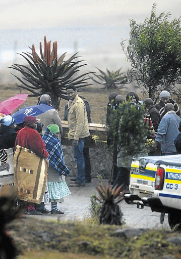 Ndaba Mandela, grandson of Nelson Mandela, at the reburial of the remains of three family members in Qunu, Eastern Cape yesterday. They were exhumed from Mvezo by court order