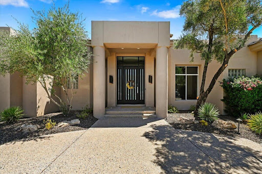 Modern house with stylized front door - House purchase in Paradise Valley, 5 bedrooms