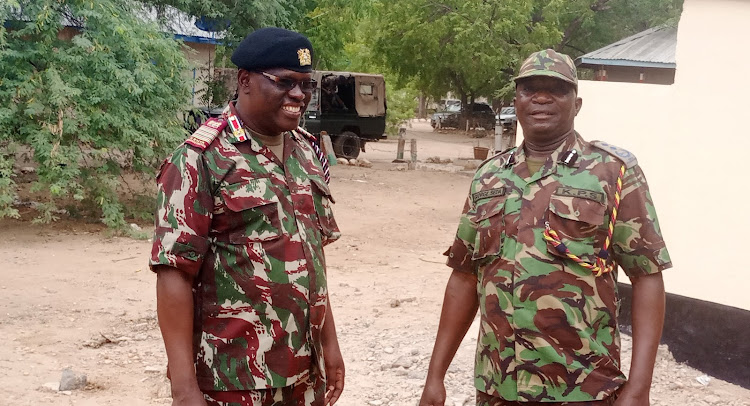 Northeastern regional commissioner John Otieno and regional police commander George Seda.