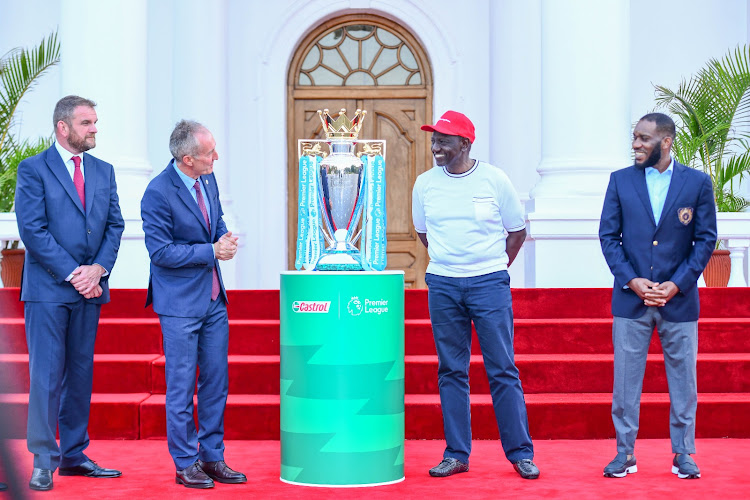 President William Ruto receives EPL trophy at State House.