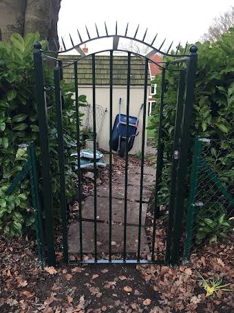 Garden security gate and arch. album cover