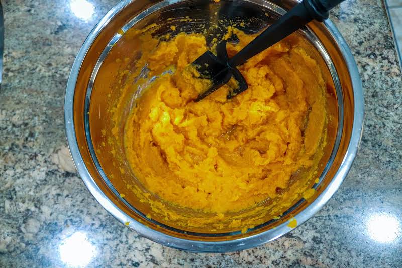 Mashing Cooked Sweet Potatoes.