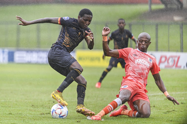 Elias Pelembe of Royal AM and Zakhele Lepasa of SuperSport United during the DStv Premiership match between Royal AM and SuperSport United at Chatsworth Stadium on February 18, 2023 in Durban, South Africa.