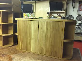 Build of two freestanding oak units. album cover