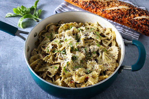 Creamy Chicken Pesto Pasta in a skillet.
