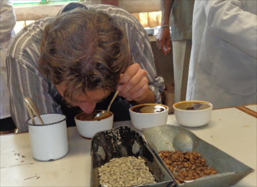 American coffee buyer Timothy O’Brien sampling coffee at Sagana/FILE