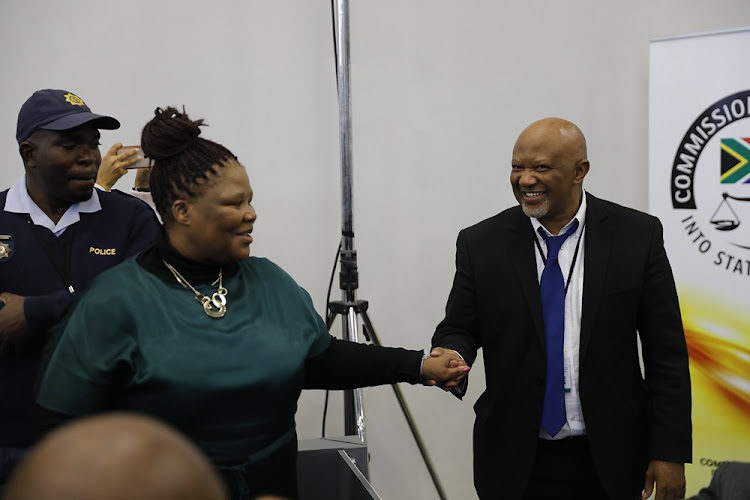 State capture whistleblower Vytjie Mentor with former deputy finance minister Mcebisi Jonas at the Zondo commission of inquiry in Parktown, Johannesburg on August 24 2018.