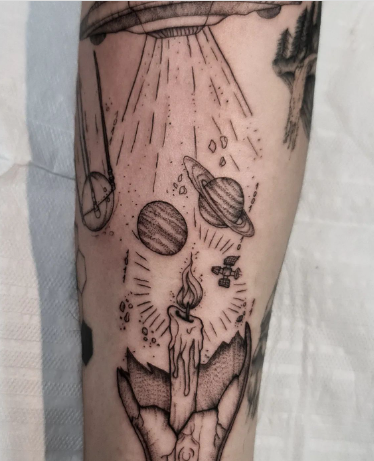 Planets Between A Spaceship And Candle In To The Broken lamp Planet Tattoo Designs Meaning