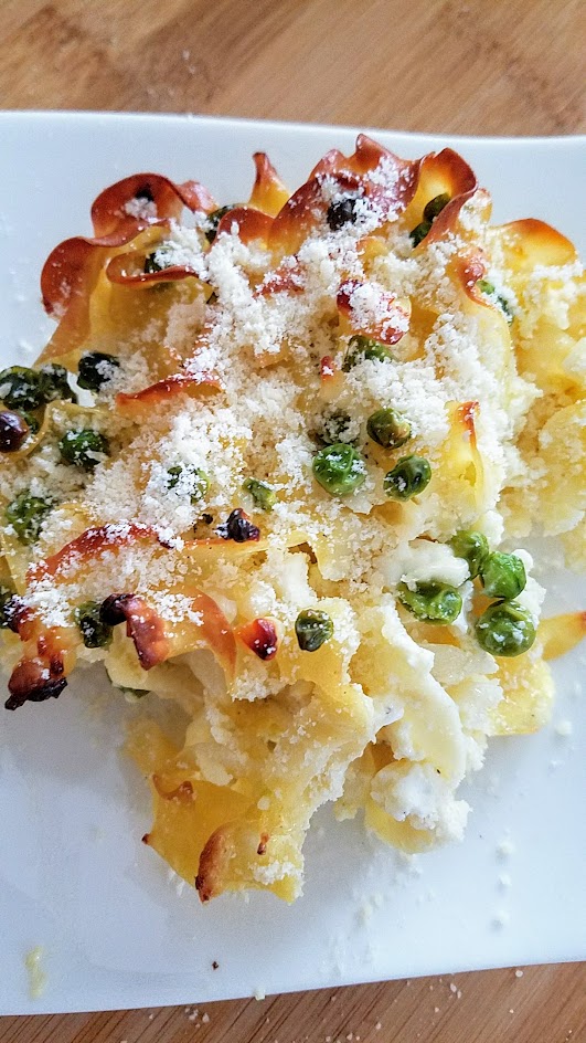 This Savory Cheese Kugel Recipe is my take on the Jewish casserole with egg noodles, butter, eggs, and cheese, with other optional add ins like here, peas and sauteed onions