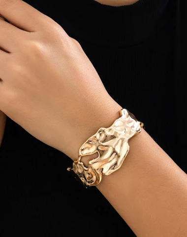 Bracelet métallique liquide plissé. - 2