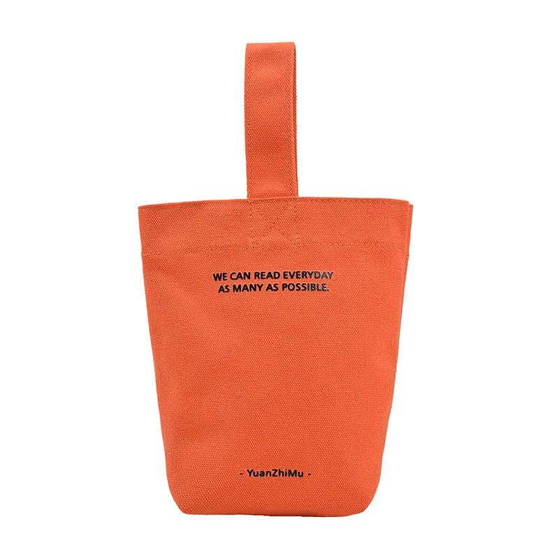 Sac à déjeuner en toile de couleur unie, idéal pour le travail, l'école ou les sorties. Durable et facile à nettoyer, parfait pour transporter vos repas.