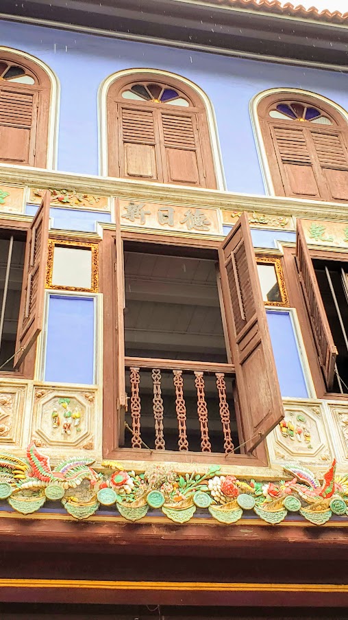 Peranakan Style Buildings in Singapore, Baba  House on Neil Street - a unique opportunity to tour a Peranakan home managed by the National University of Singapore. Tours are limited to once a day and small groups based on what the original building floors can hold, so book your reservation for a tour early