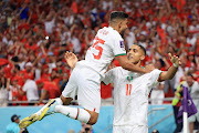 Abdelhamid Sabiri of Morocco celebrates with Yahya Attiat-Allah after scoring their first goal in the World Cup Group F match against Belgium at Al Thumama Stadium in Doha, Qatar on November 27 2022.