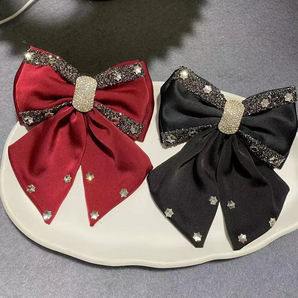 Nieuwe luxe haarspeld met strik en veerklem, perfect voor elegante kapsels, houdt het haar stijlvol vast en biedt comfort.
