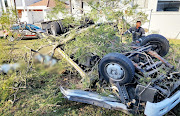 A fully loaded rol-back tow truck lost control on a bend and struck four children before overturning and coming to rest on its roof in Chatsworth.