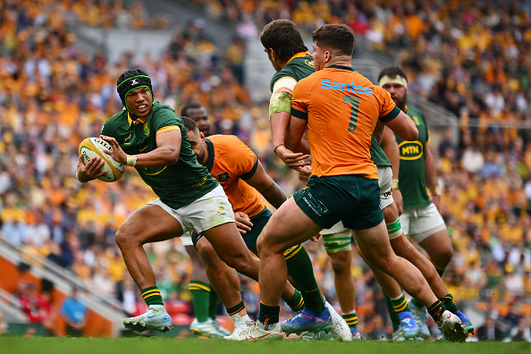 Springbok winger Kurt-Lee Arendse runs with the ball during the Rugby Championship match against Australia at Suncorp Stadium in Brisbane, Australia.