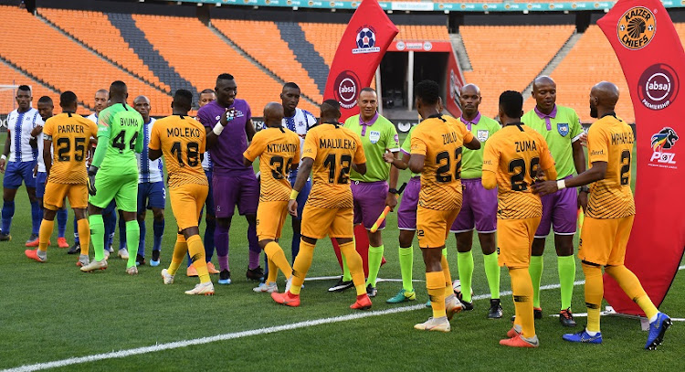 Officials and players during the Absa Premiership match between Kaizer Chiefs and Maritzburg United at FNB Stadium on March 09, 2019 in Johannesburg, South Africa.