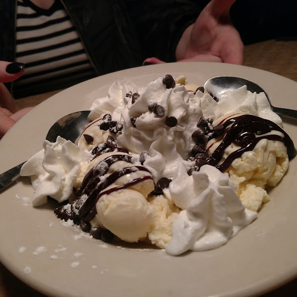 GF Iceoli (cannoli filling based sundae with 4 scoops of vanilla ice cream, whipped cream, mini chips and your choice of hot fudge or strawberries).  = A big favorite!