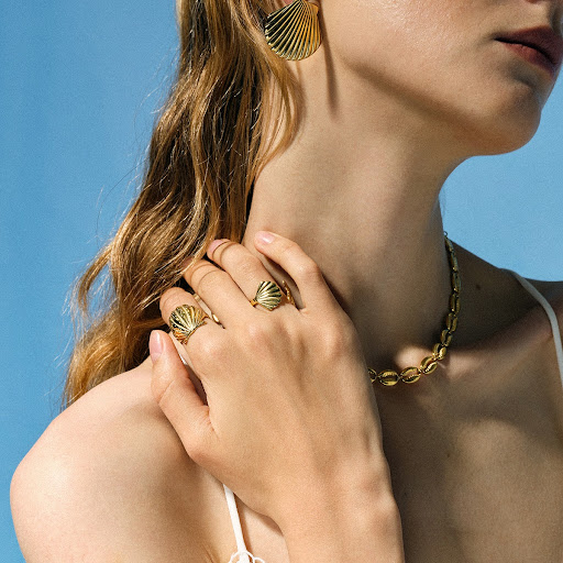 Title 1, Nicole Seashell Gold Earrings add a touch of el...