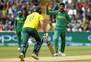 MISSING LEG: Pakistan's Mohammad Amir appeals for the wicket of South Africa's David Miller at their Champions Trophy match at Edgbaston yesterday.