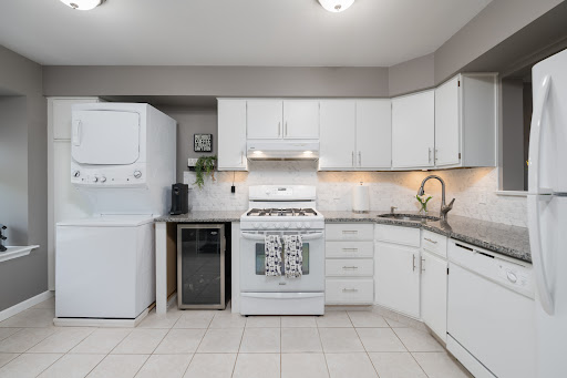 White kitchen with appliances and countertop - Property purchase in Toms River, 5 rooms, 2 bedrooms