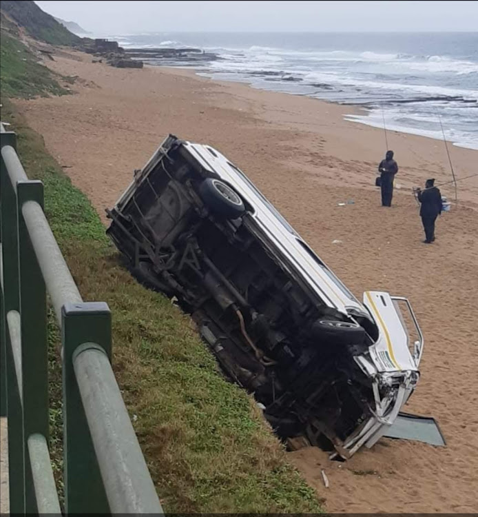 A taxi hit a few vehicles before crashing onto the shore in Isipingo on Monday.