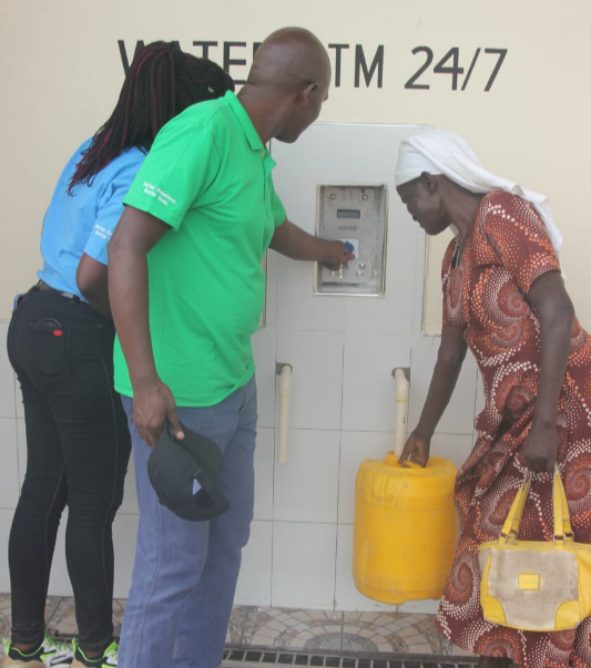 A woman draws water at the newly launched Sh15 million solar powered water project in Katito on Thursday