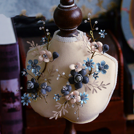 Pair of blue headdresses