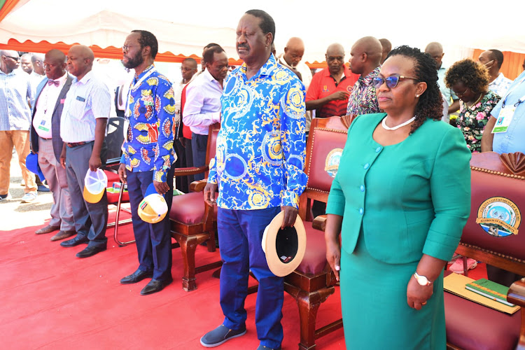 Kisumu Governor Anyang' Nyong’o, Azimio presidential flag bearer Raila Odinga and Lapfund board chairperson Sellestina Kiuluku during the groundbreaking ceremony for the Sh3.5billion housing units at Makasembo estate on Wednesday.