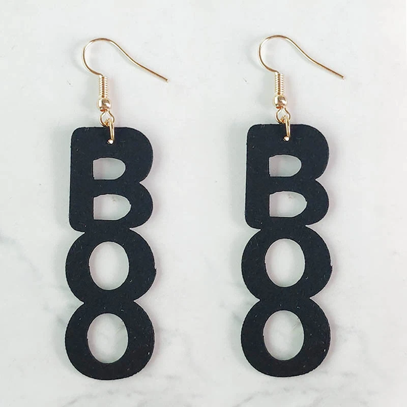 Boucles d'oreilles araignée crâne Halloween pour femme, parfaites pour les costumes et les fêtes. Ajoutez une touche gothique à votre look!