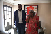 Siyabonga Meyiwa with Senzo's mom Ntombifuthi at the family's Umlazi home on Monday.