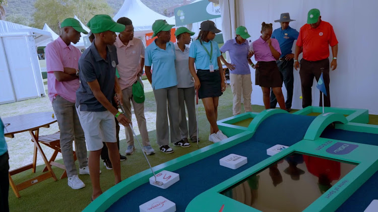 Development golf players participate at recent Nedbank Golf Challenge activation.