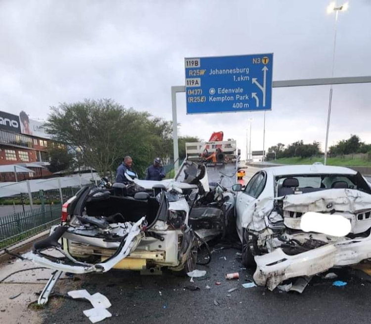 A case of reckless and negligent driving was opened after a motorist crashed into JMPD officers while they were attending to an accident scene.